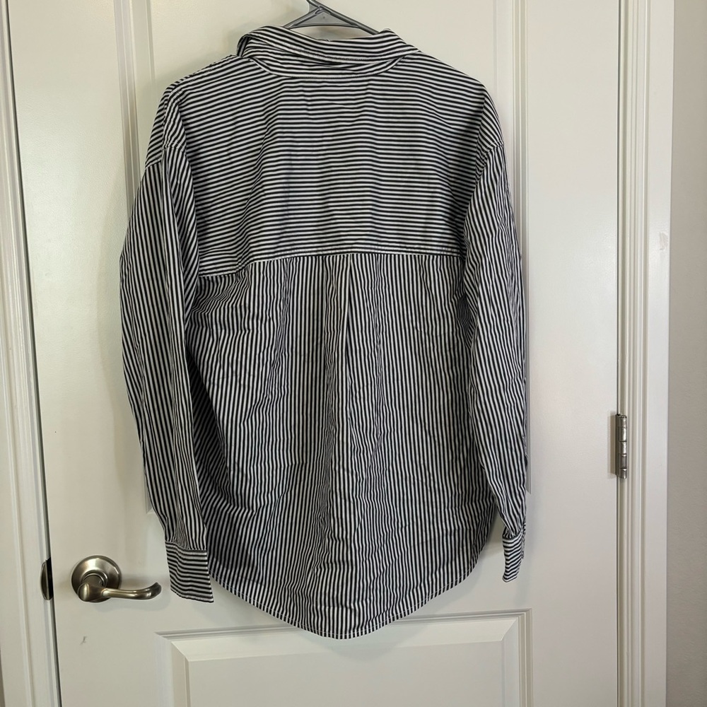 ￼ Black, and white striped button up